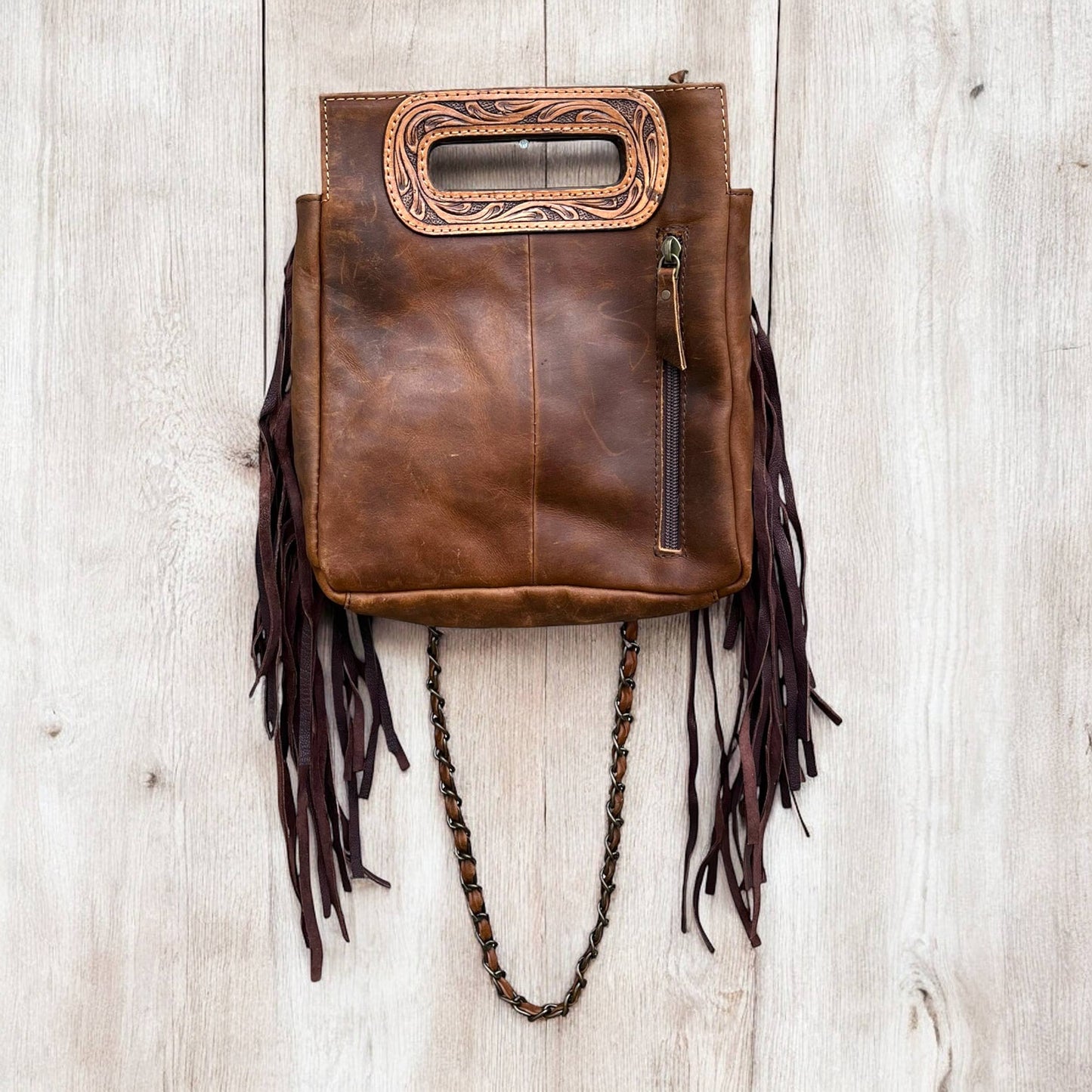 Cowgirl tooled leather & cowhide fringe crossbody bag
