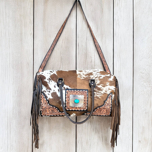 Brown tooled leather & cowhide duffle bag 