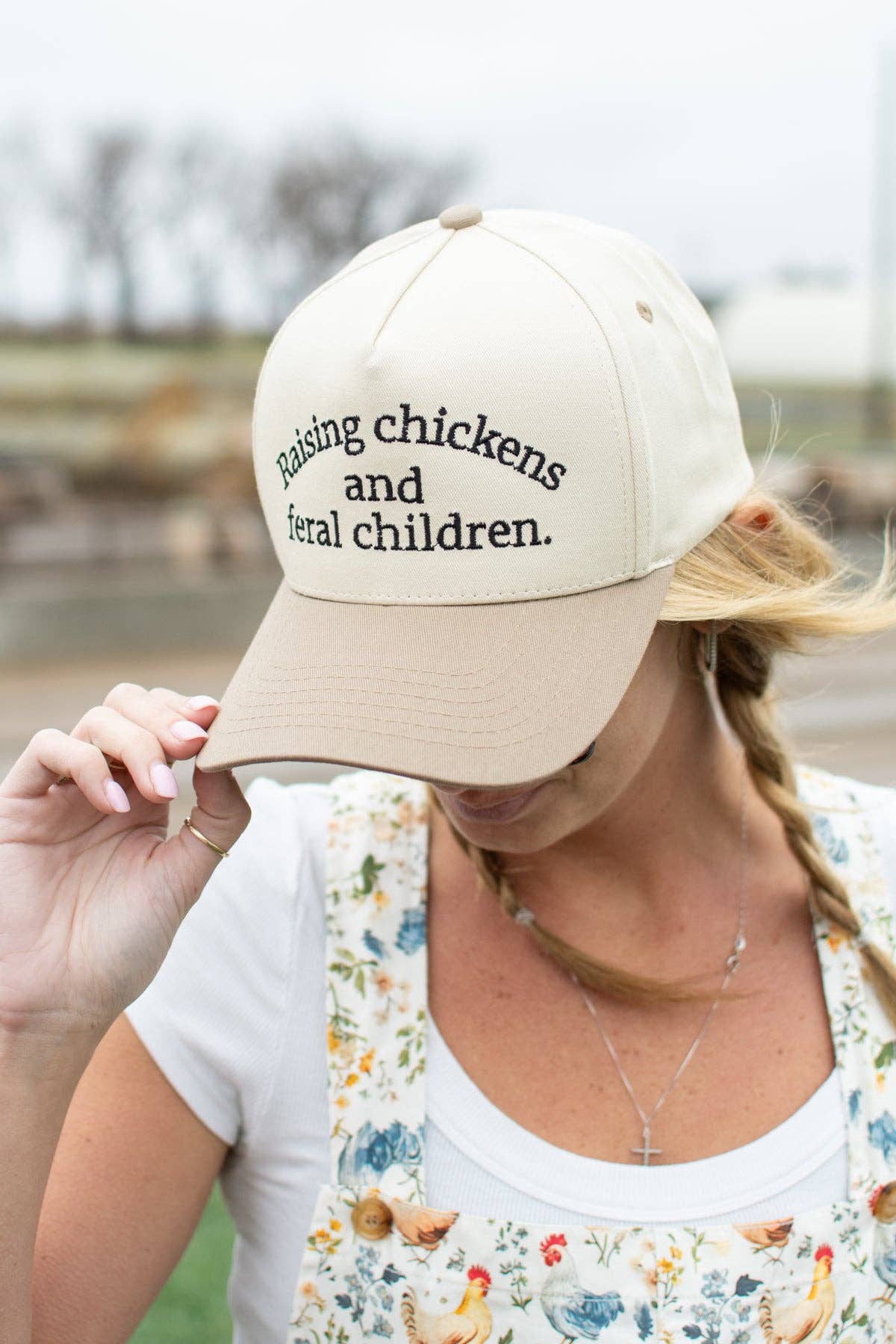 'Raising Chickens and Feral Children.' Embroidered Trucker Hat