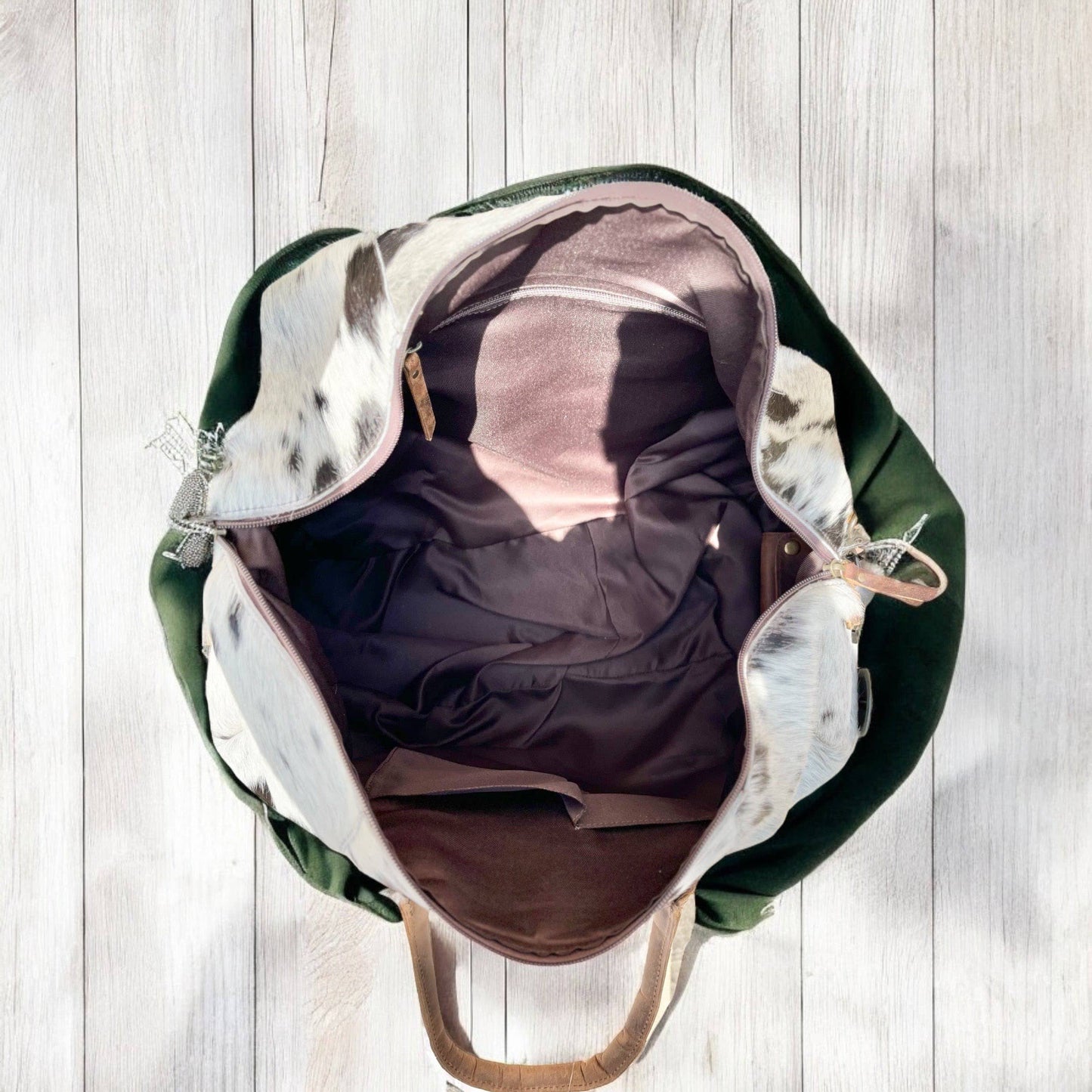 Brown tooled leather & cowhide duffle bag 