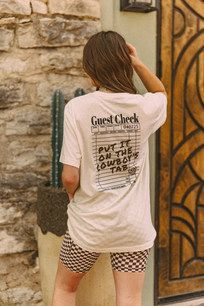 Put it on the Cowboy's Tab tee